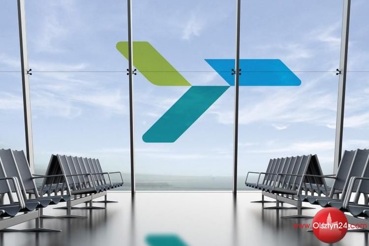 Lotnisko w Szymanach z logo